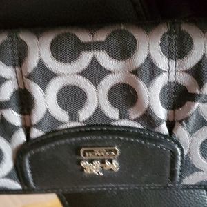 Coach black leather and canvas zip wallet